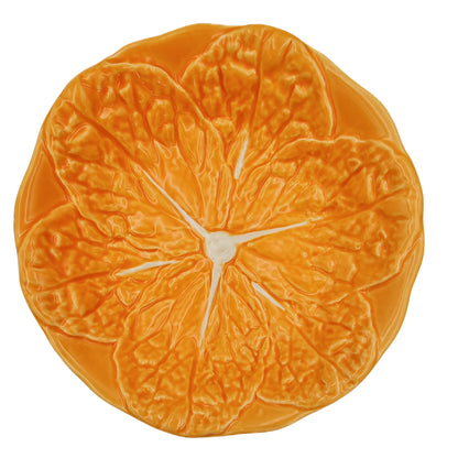 En orange skål i keramik i form av ett kålblad från Portugal.